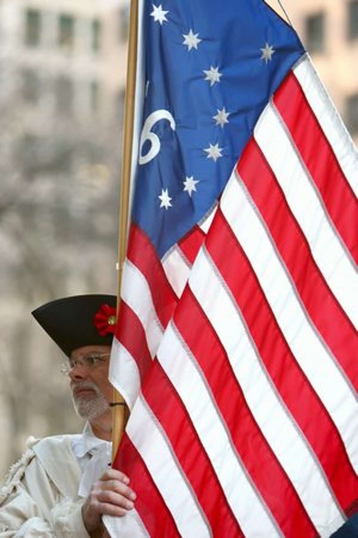 A participant holds a flag.