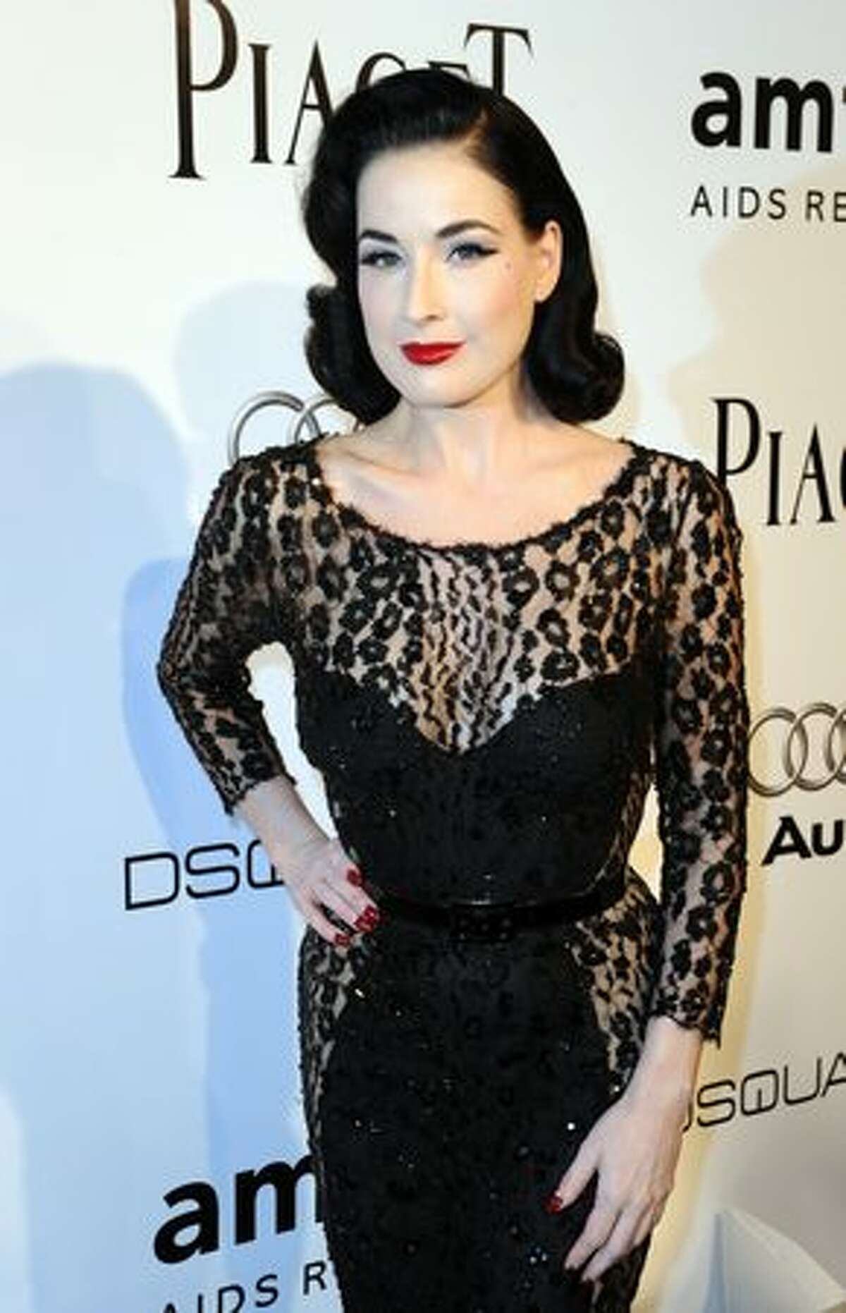 Dita Von Teese arrives at the amfAR's Inspiration Gala Los Angeles to benefit the Foundation's AIDS research programs at the Chateau Marmont in Hollywood, California.
