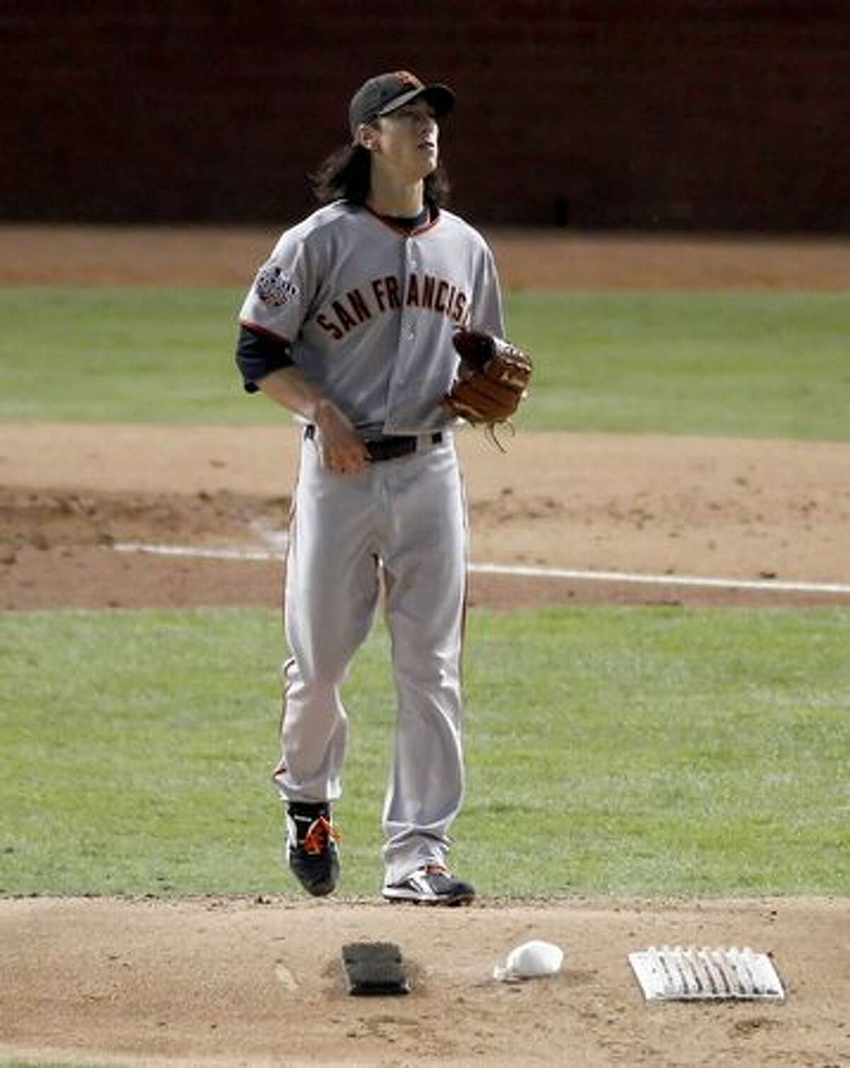 San Francisco Giants starting pitcher Tim Lincecum (55) returns to the mound after striking out Bengie Molina in the third inning during game 5 of the 2010 World Series between the San Francisco Giants and the Texas Rangers on Monday in Arlington, Tx.