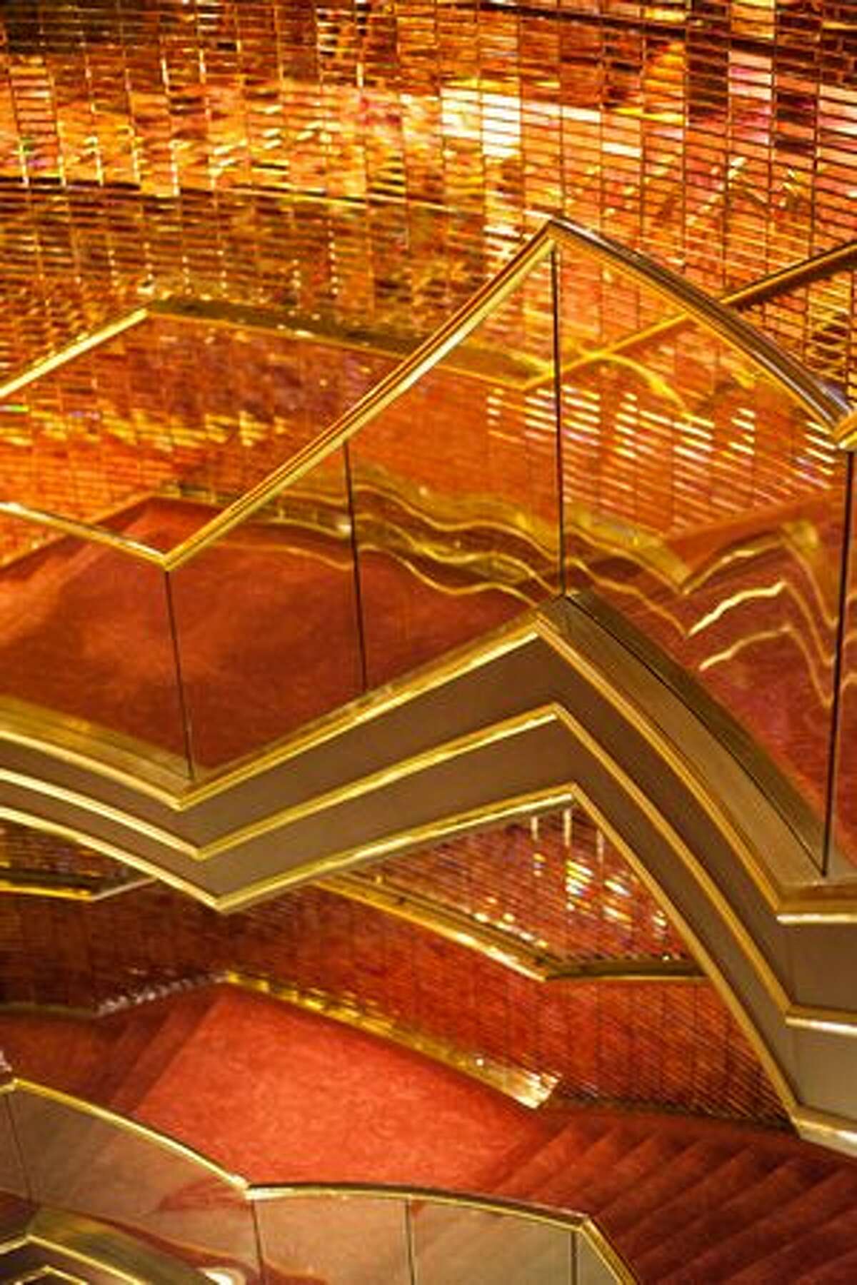 Golden staircases in the Atrium aboard Holland America Line's MS Amsterdam, which visited Seattle on Monday.