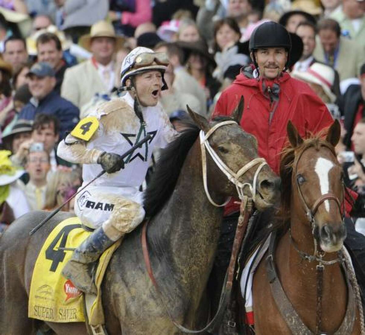 Jockey Calvin Borel wins his third Kentucky Derby in the last four years on Super Saver at Churchill Downs in Louisville, Kentucky May 1, 2010. (Skip Dickstein / Times Union)