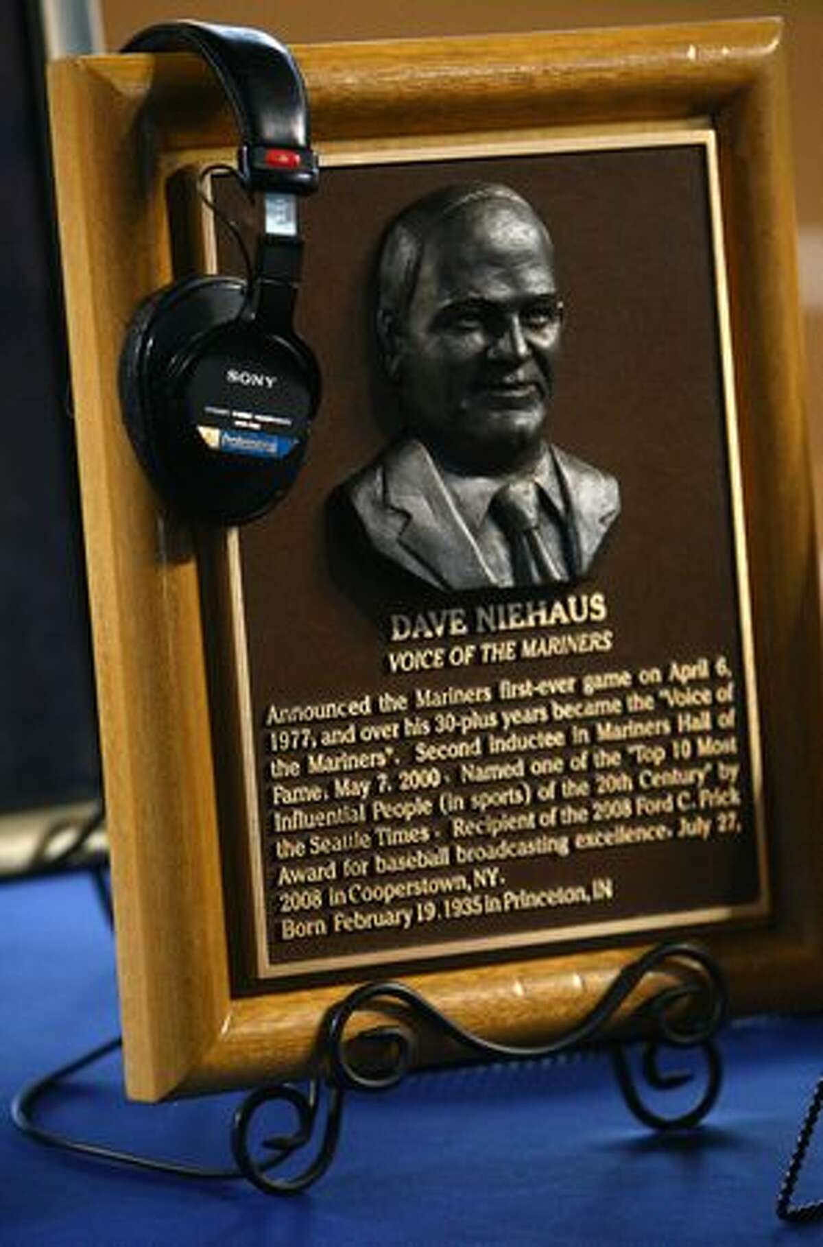 Dave Niehaus' headset rests on a plaque during a tribute for Niehaus on Saturday at Safeco Field in Seattle. Niehuas died earlier in the week from a heart attack. The popular play-by-play announcer was the voice of the Seattle Mariners since the team's inaugural season in 1977.