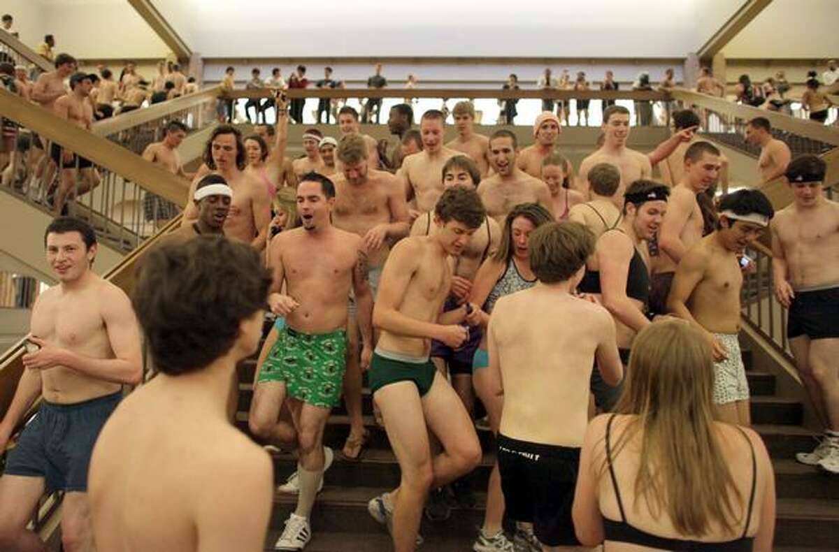 Hundreds of University of Washington students run through Odegaard Undergraduate Library on the school's campus during the "AXE Undie Run Challenge." During the Undie Run students donated their clothes to charity and then ran a course around campus in their skivvies.