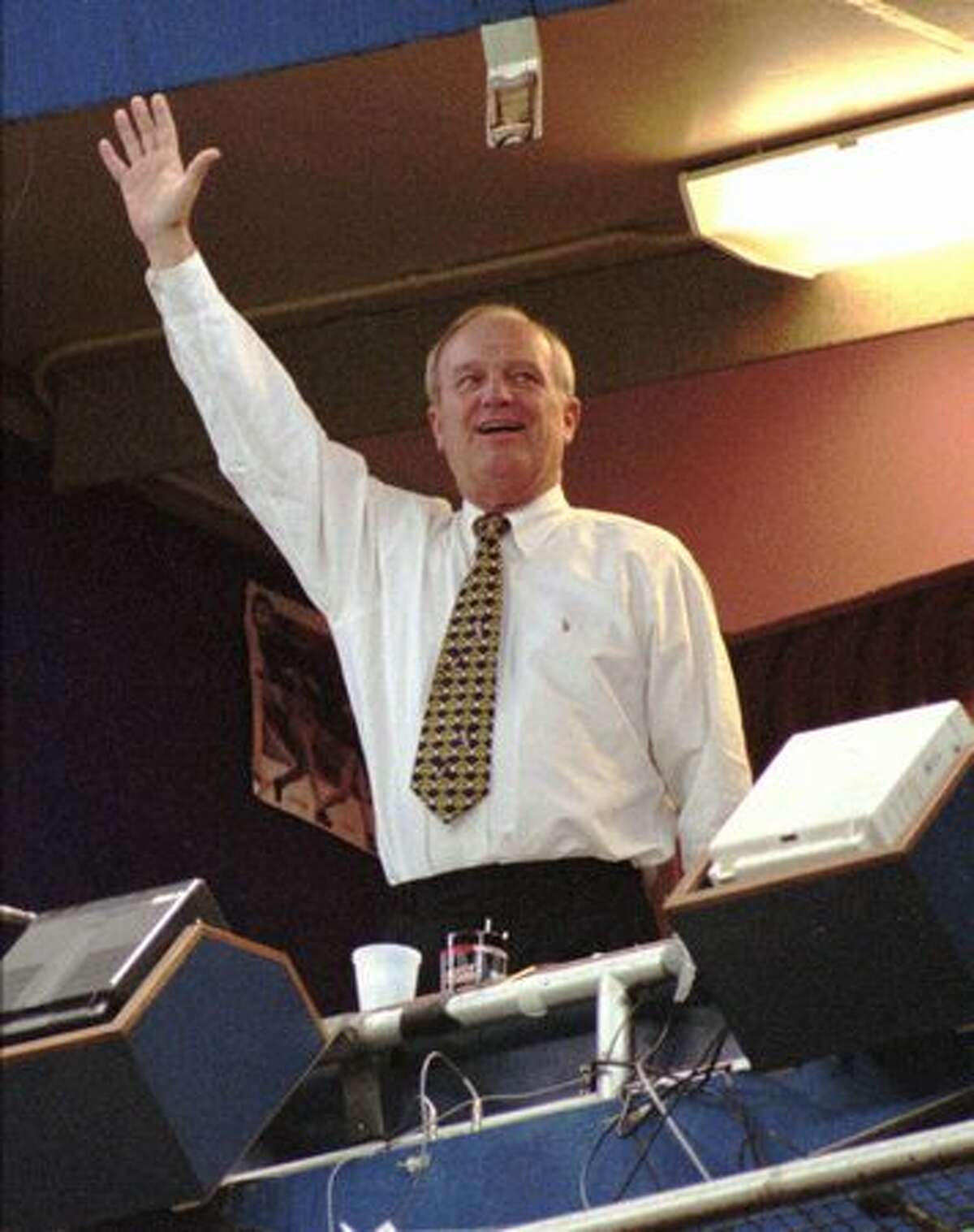 Seattle Mariners longtime radio announcer Dave Niehaus waves from the Kingdome broadcast booth Sept. 22, 1996. The appearance was Niehaus' first since a second angioplasty sidelined him earlier in the month. (Robert Sorbo/The Associated Press/seattlepi.com file)