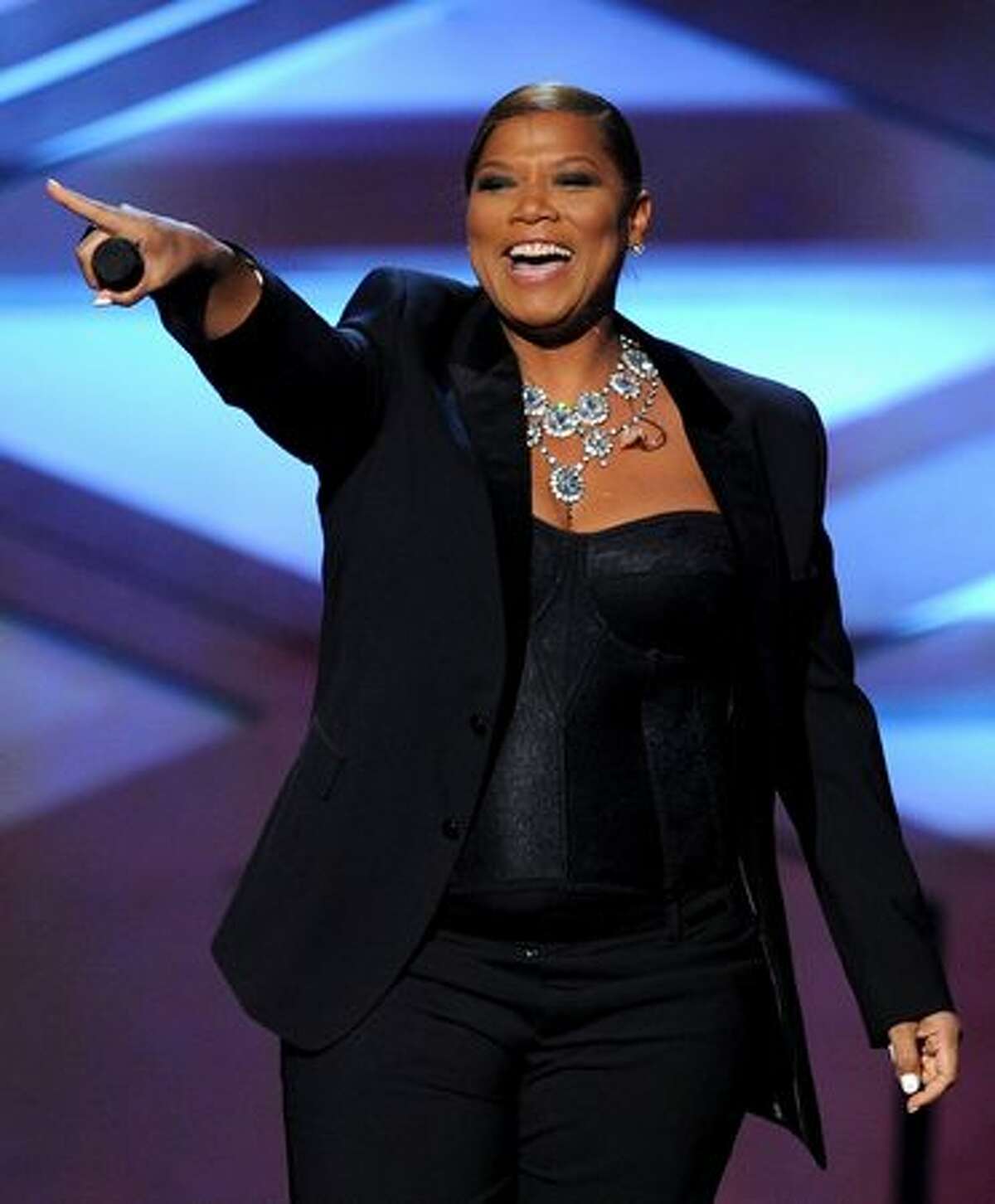 Host Queen Latifah speaks onstage during the 2011 People's Choice Awards at Nokia Theatre L.A. Live in Los Angeles, California.