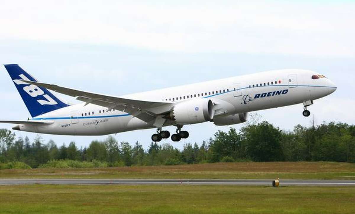 A Boeing 787 takes off during the first flight of the Boeing 787 powered with General Electric's GEnx engines on Wednesday.