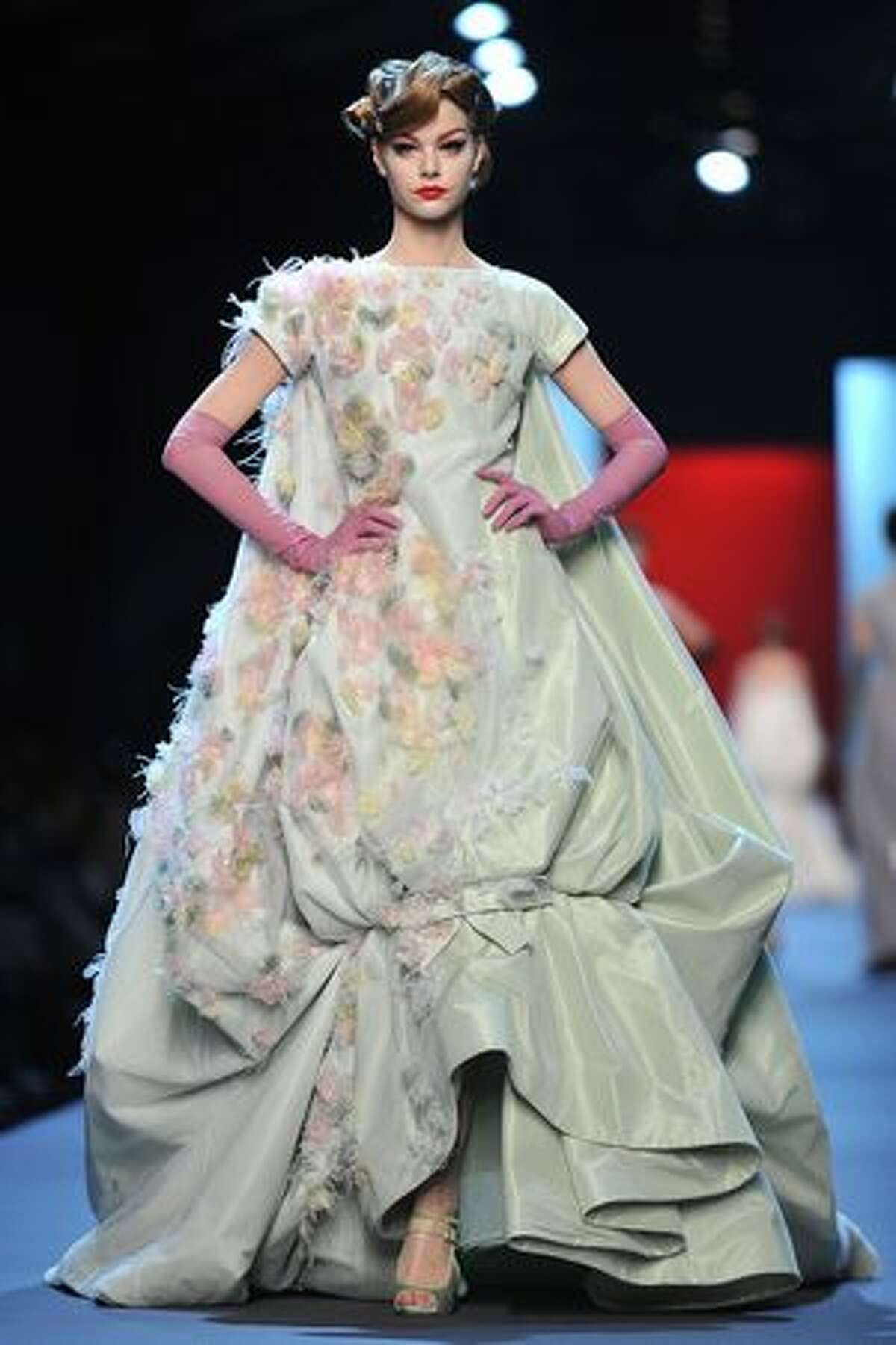 A model walks the runway during the Dior Haute Couture Spring