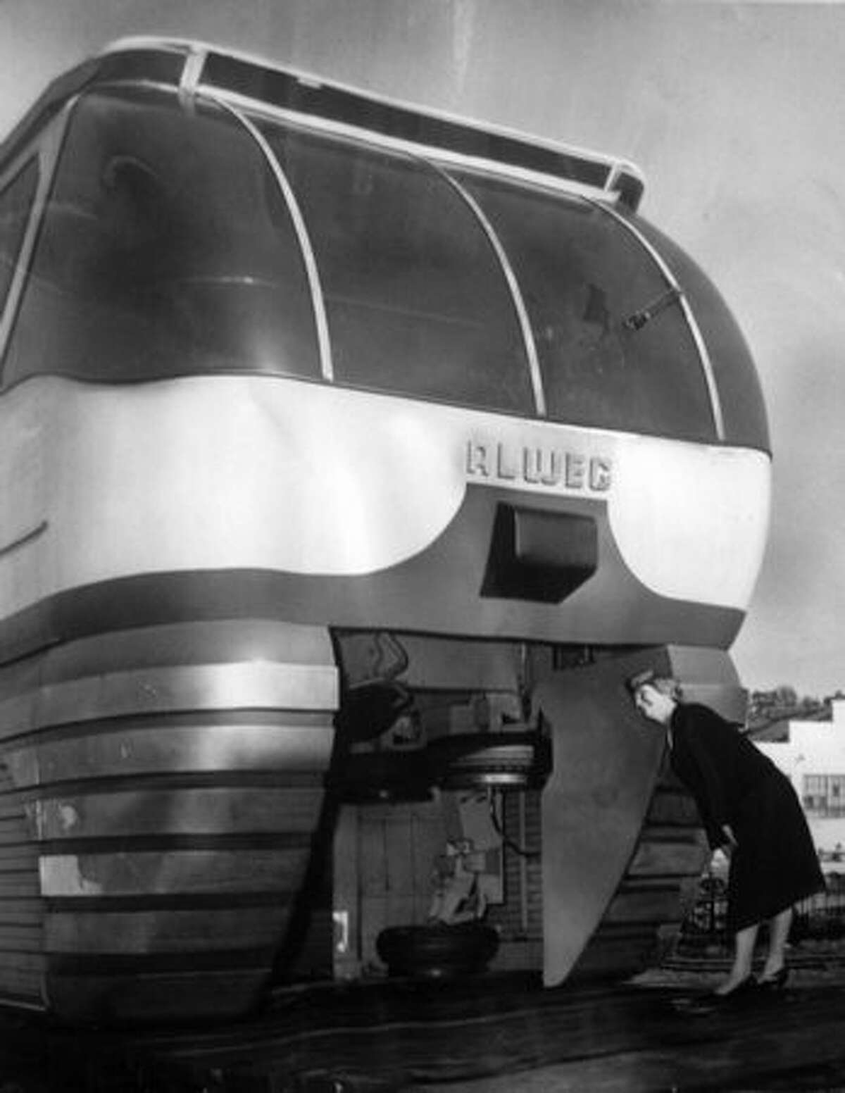 In this Feb. 18, 1962 photo, Barbara Bidstrup looks in at the Seattle monorail.