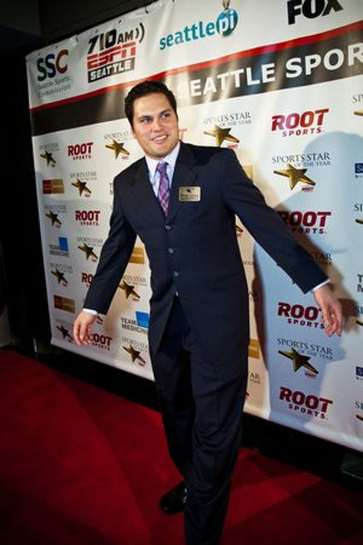 University of Washington Rose Bowl quarterback Marques Tuiasosopo arrives at the 76th Annual Sports Star of the Year, presented by ROOT SPORTS, at Benaroya Hall in Seattle Wednesday, Jan. 26, 2011. The evening honors Northwest sports stars, carrying on an annual tradition started by Seattle Post-Intelligencer sports editor Royal Brougham in 1936.