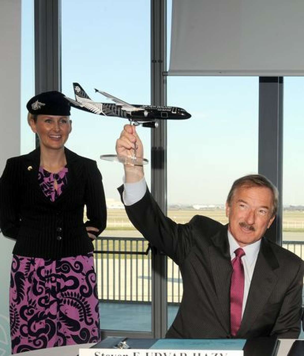 Air Lease Corporation President Stevan Udvar-Hazy holds an Airbus model as he attends a press conference on January 28, 2011 in Colomiers, France during the first delivery of an A320 Airbus painted with the logo of New Zealand rugby national team, the All Blacks.