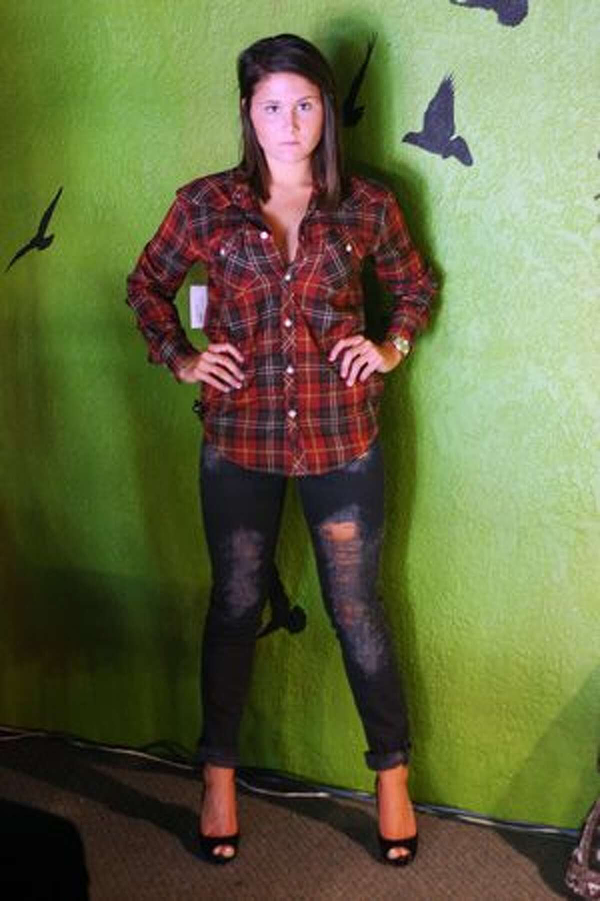 Alexus Sheft, sister of the owner Brittany Shefts, models a modern farmgirl look.