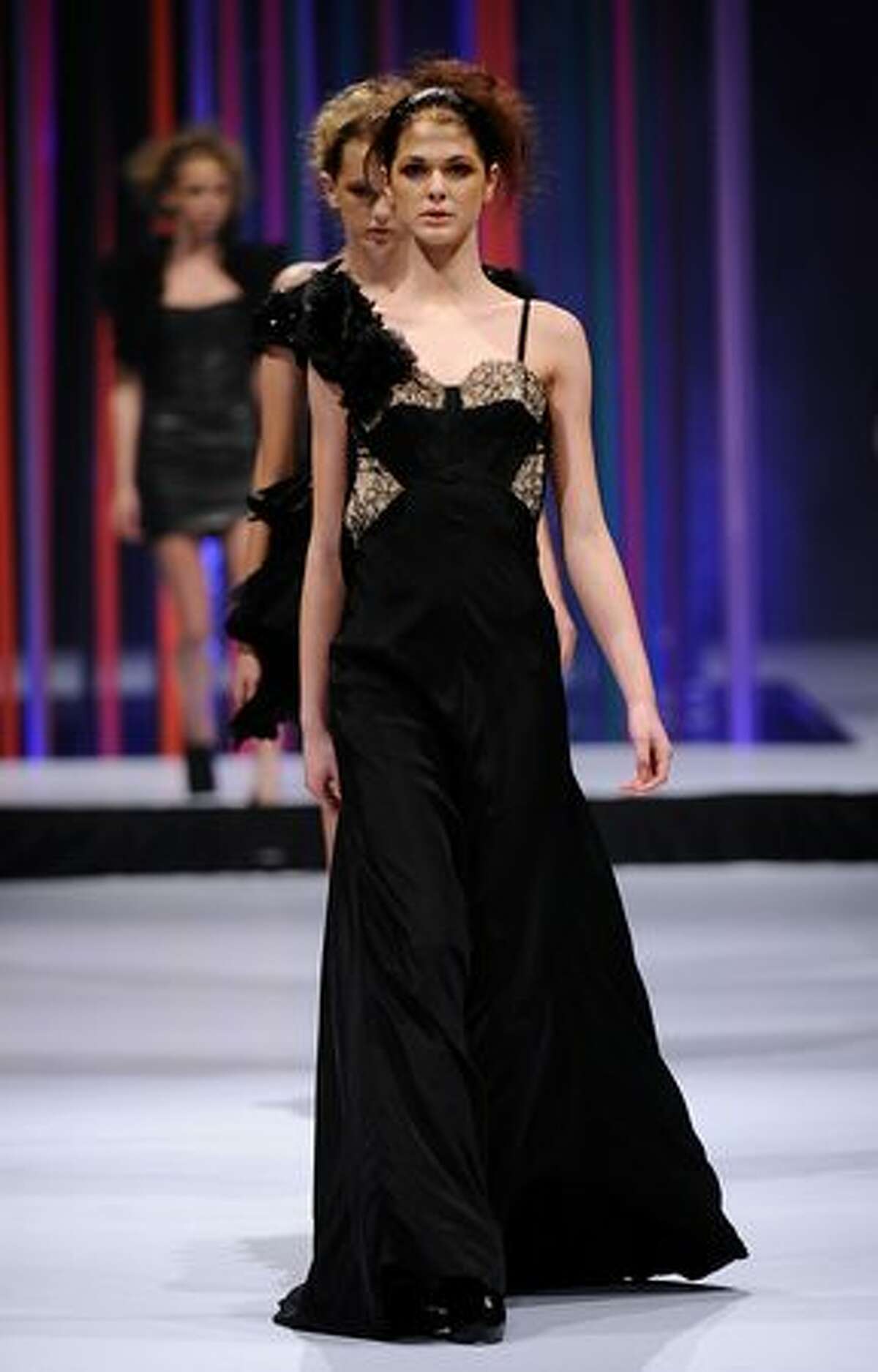 A model showcases a design by Aurelio Costarella on the catwalk during the StyleAid Perth Fashion Event 2010 at the Burswood Entertainment Complex in Perth, Australia.