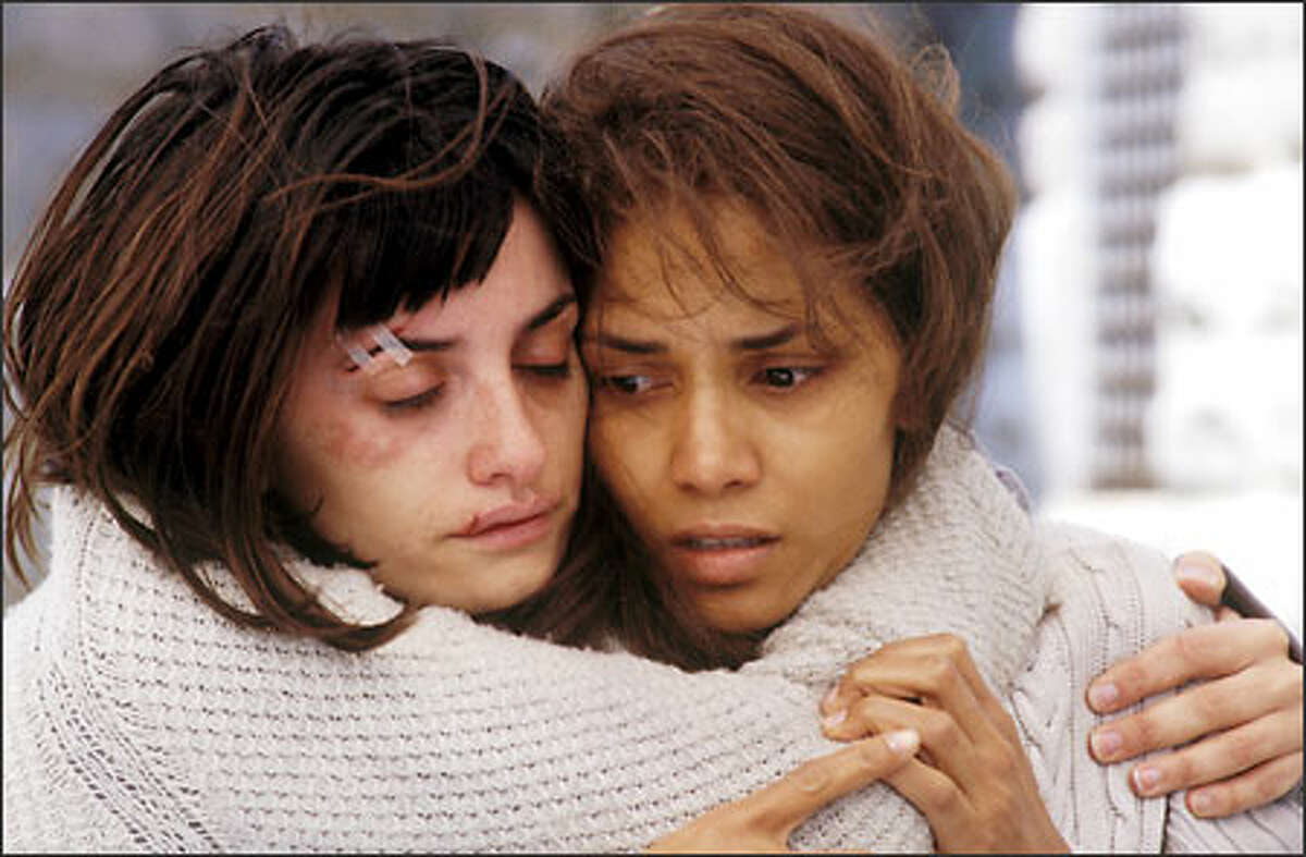 Halle Berry plays a criminal psychologist in "Gothika" who treats a disturbed mental patient, played by Penelope Cruz.