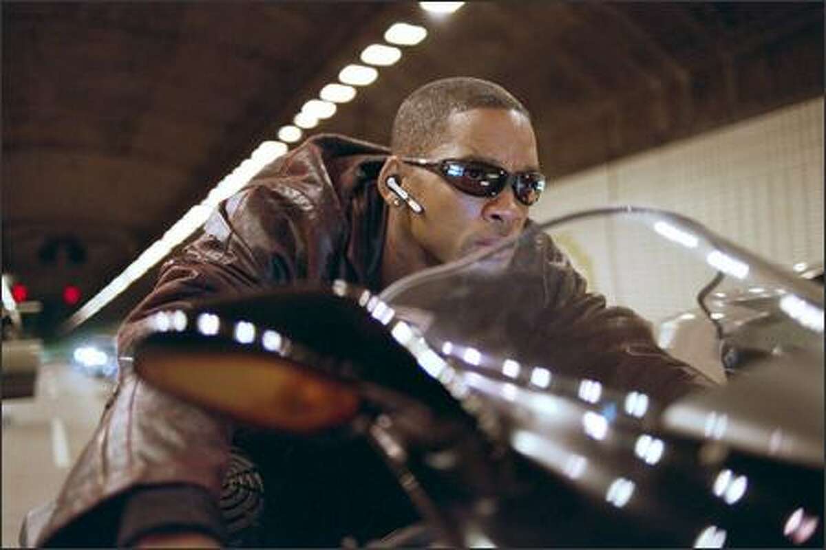 Det. Del Spooner (Will Smith) races to the scene of an incredible robot uprising. His aversion to technology -- and to robots, in a world where they're an essential part of everyday life -- was seen as a critical element of the film.