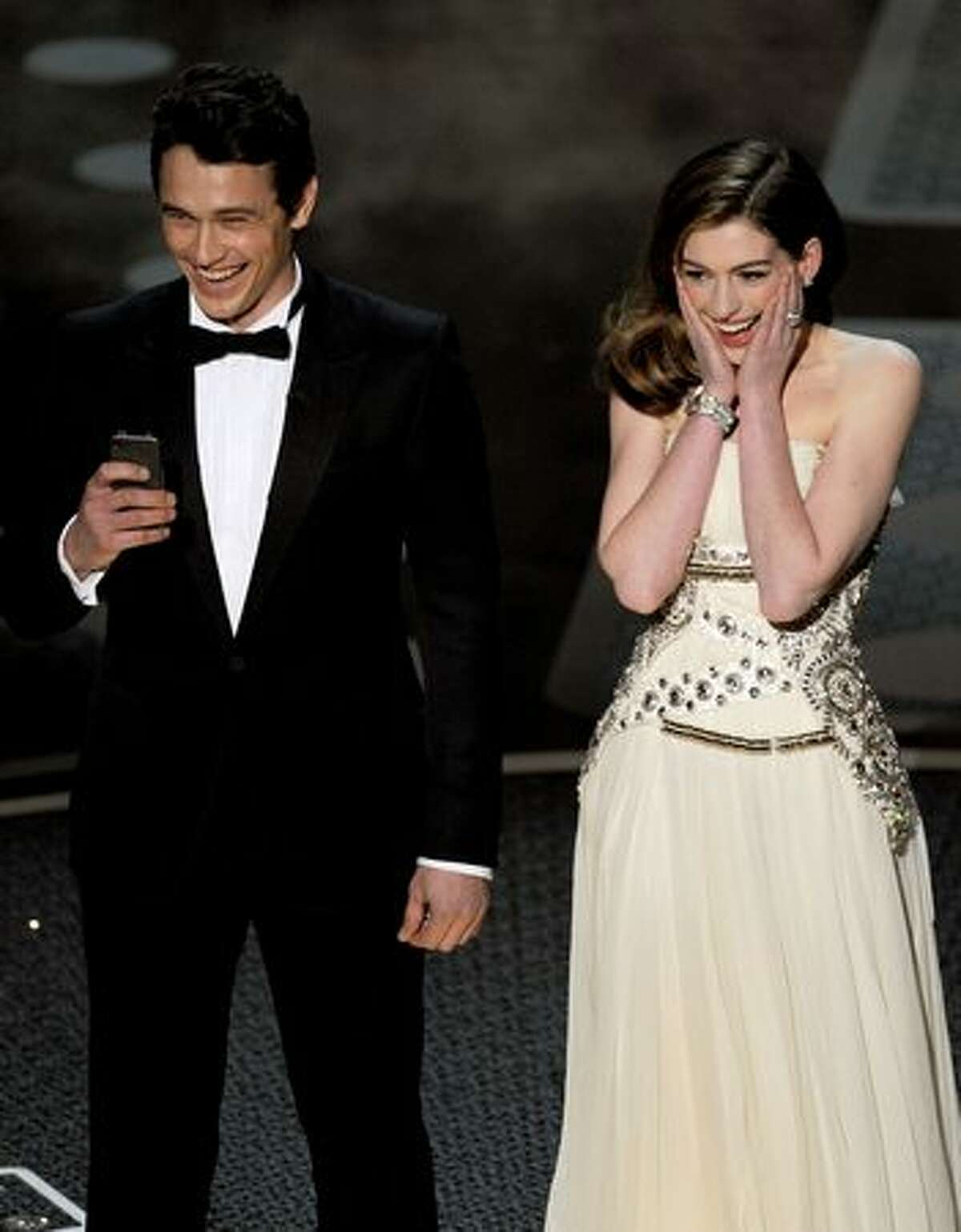 Hosts James Franco and Anne Hathaway speak onstage during the 83rd Annual Academy Awards held at the Kodak Theatre in Hollywood, California.