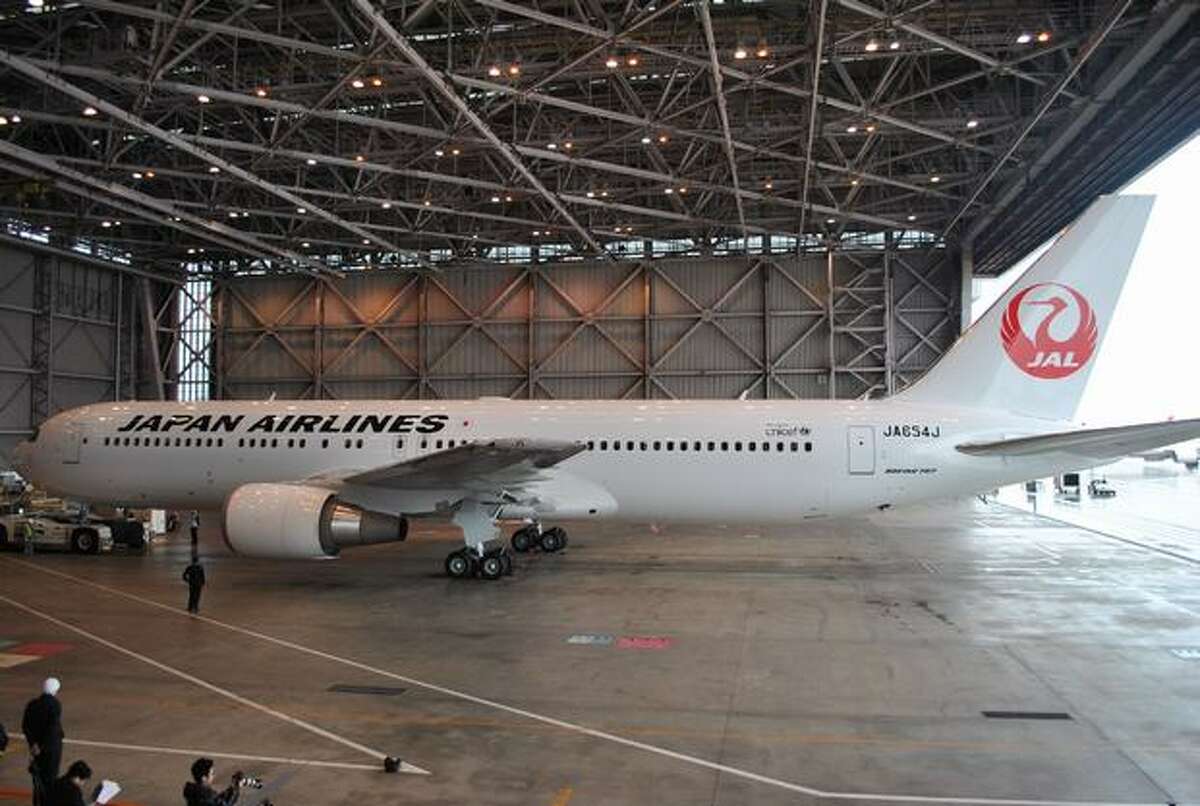 Japan Airlines unveils a new Boeing 767-300ER painted with the airline's latest crane livery at Tokyo's Haneda Airport. (Japan Airlines) See the original post
