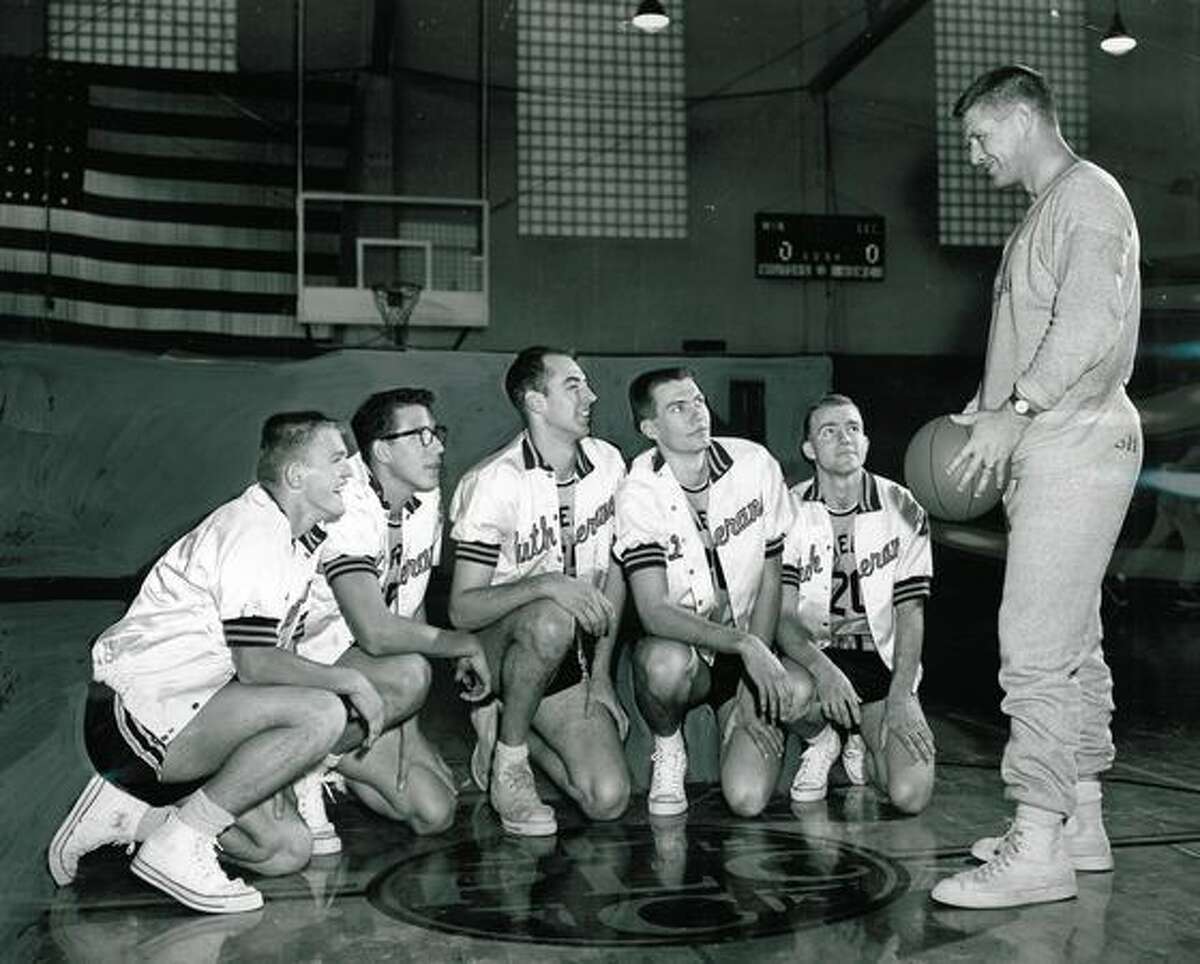 Marv Harshman, right, as coach of the Pacific Lutheran College basketball team, Feb. 26, 1957.