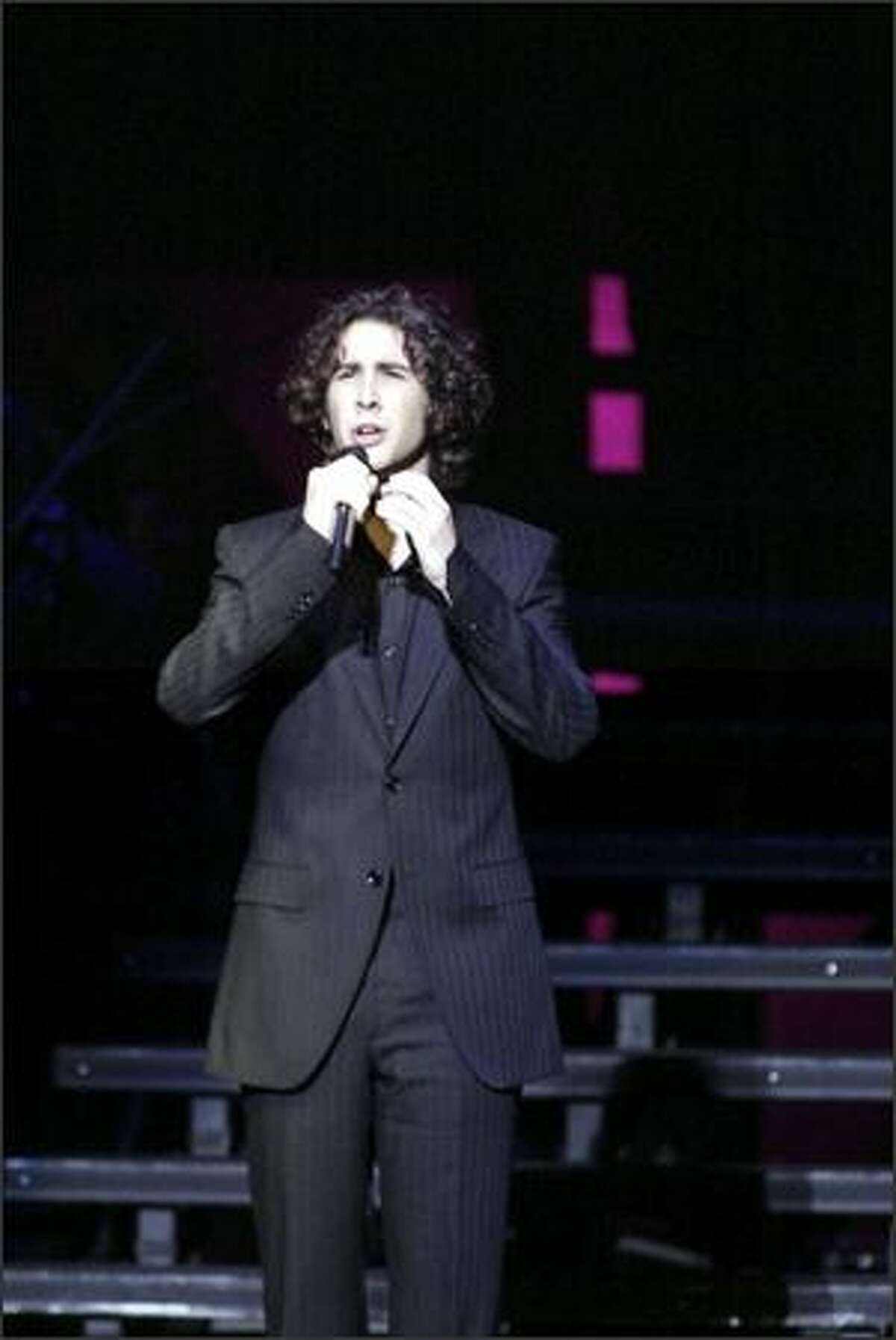 Pop singer Josh Groban sings to a sold out crowd at the Paramount Saturday night in Seattle. It only took 30 minutes to sell out all 130,000 seats in his first-ever 40-city nationwide tour.