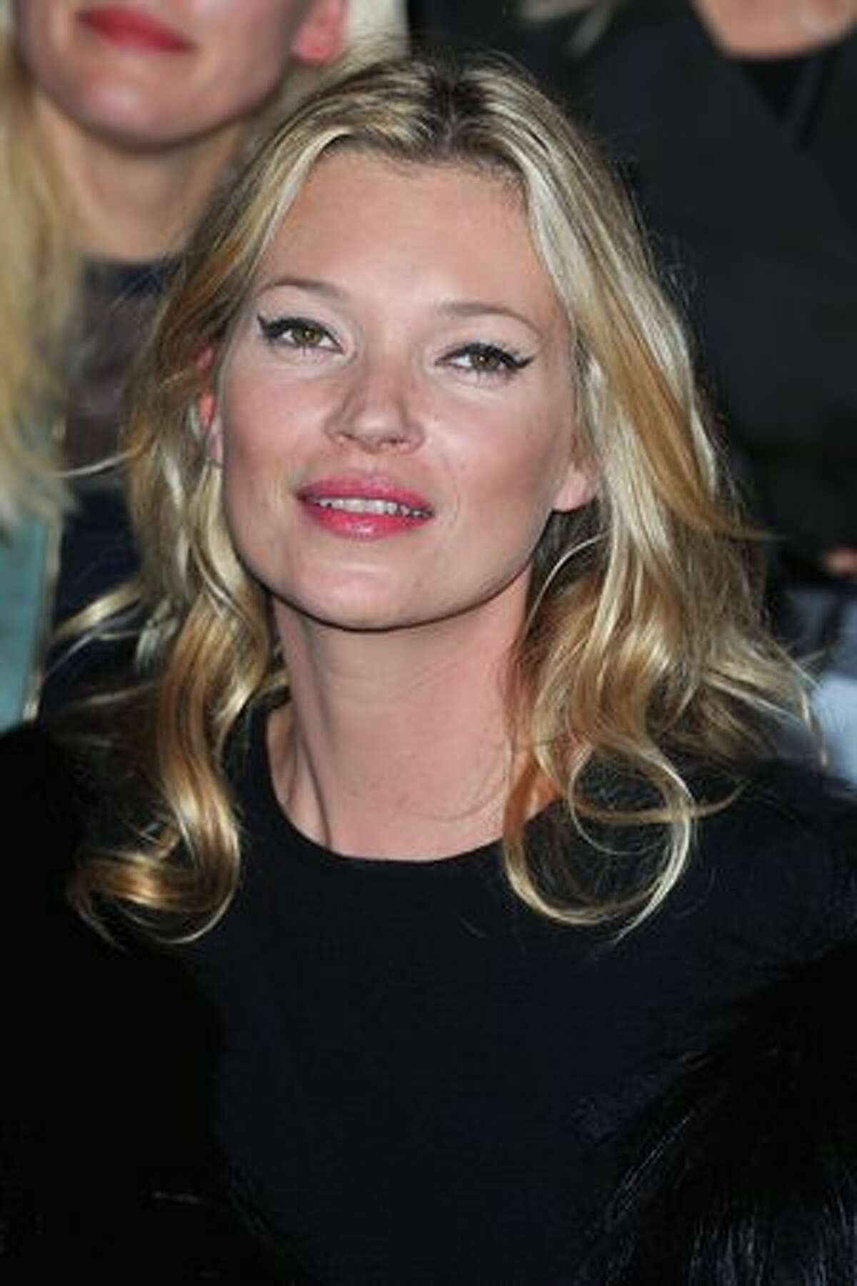 Kate Moss attends the Christian Dior Ready to Wear Spring/Summer 2011 show during Paris Fashion Week in Paris, France.