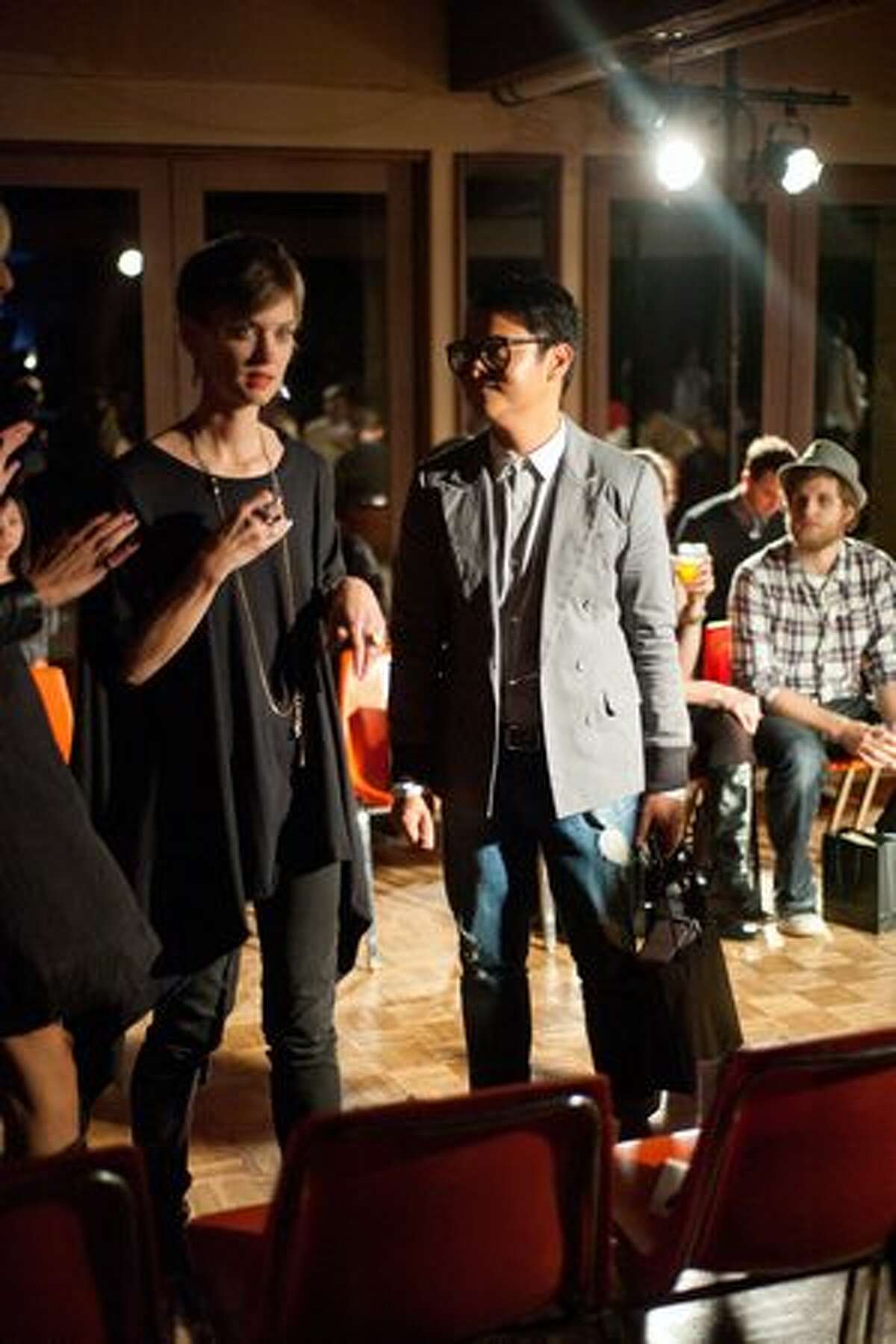 Guests at Blackbird's Autumn/Winter Runway Presentation talk and laugh as they wait for the show to begin.