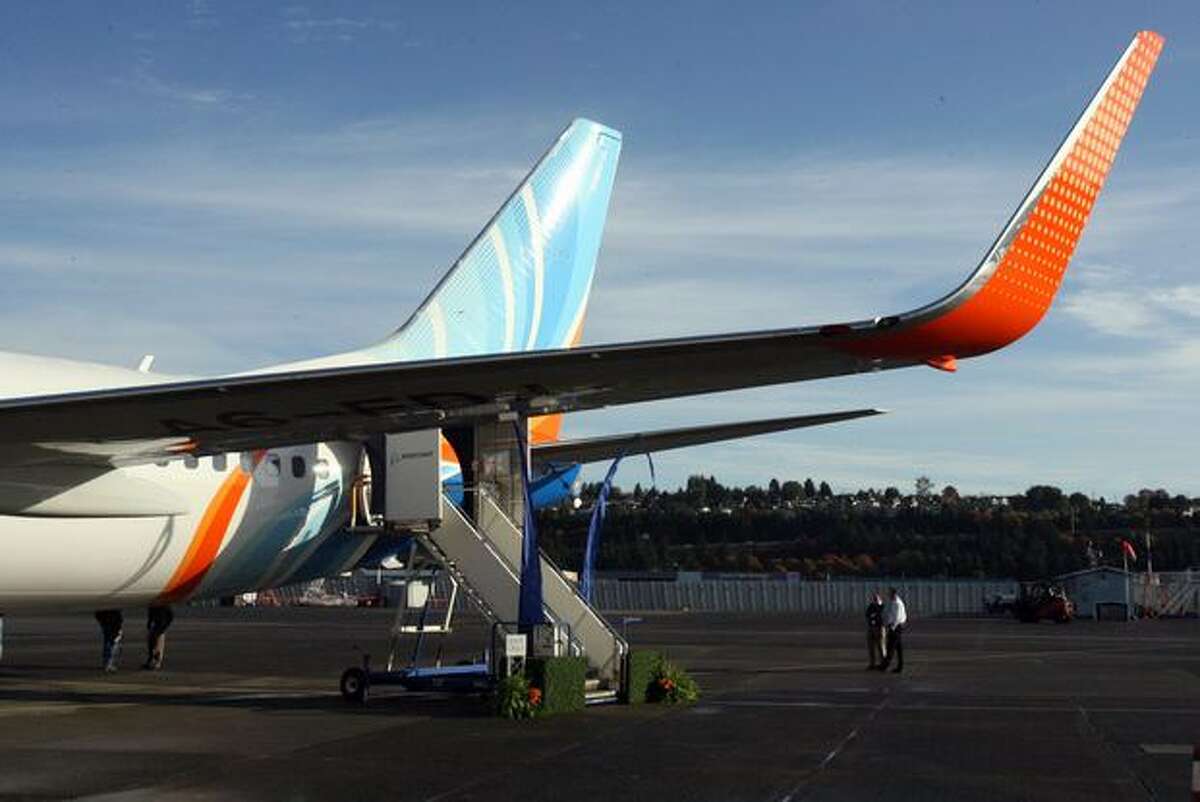 Low-cost airline flydubai's new Boeing 737-800, the first with a Boeing Sky Interior, sits at Boeing Field, in Seattle, before its delivery ceremony.