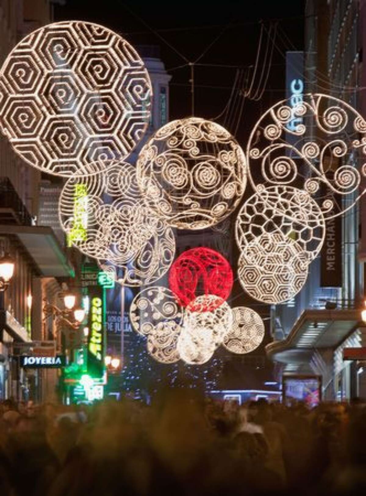 Christmas lights illuminate the calle de Preciados in Madrid, Spain.