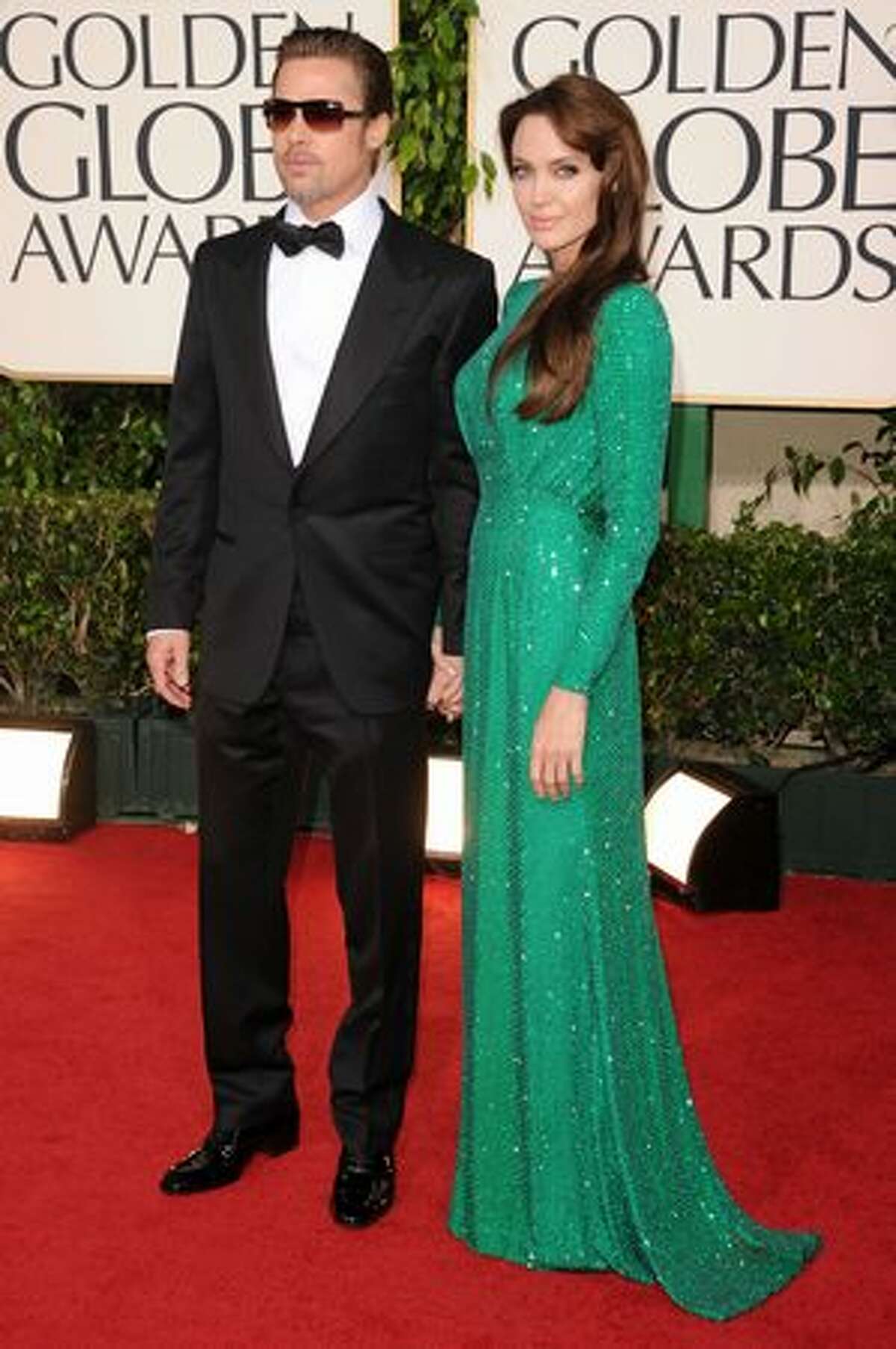 Actor Brad Pitt (left) and actress Angelina Jolie arrive at the 68th annual Golden Globe Awards held at The Beverly Hilton hotel in Beverly Hills, Calif., on Sunday, Jan. 16, 2011.
