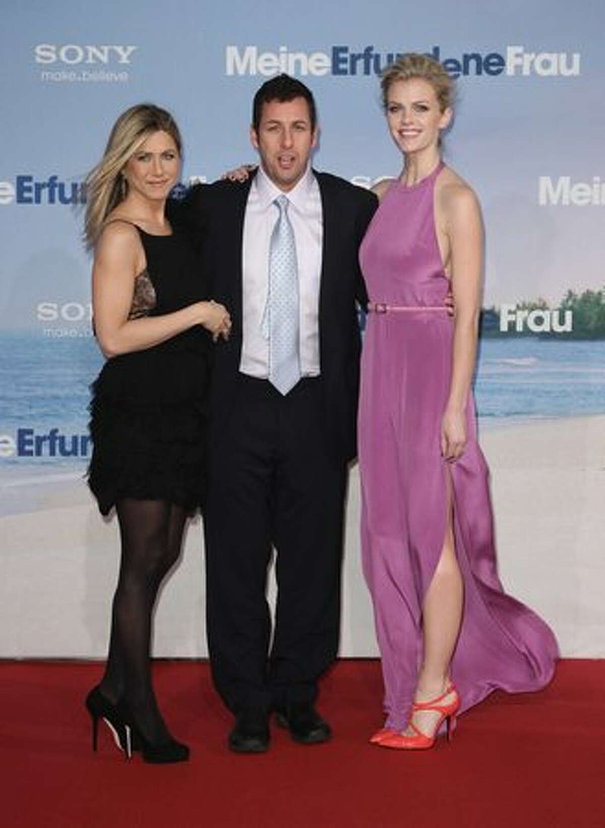 (L-R) Actress Jennifer Aniston, actor Adam Sandler and actress Brooklyn Decker attend the 'Just Go With It' Germany premiere at CineStar in Berlin, Germany.
