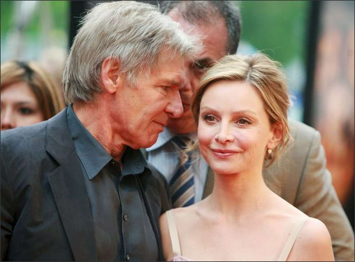 Actors Harrison Ford (L) and Calista Flockhart attend the New York premiere of "Indiana Jones and the Kingdom of the Crystal Skull" at the AMC Magic Johnson Theatre in Harlem on Tuesday in New York City.