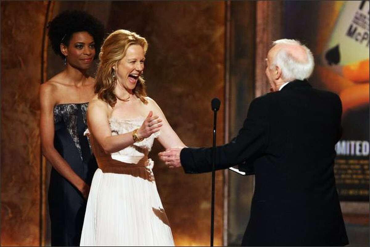Actress Laura Linney presents the Tony for Featured Actor in a Play to Jim Norton onstage during the 62nd Annual Tony Awards held at Radio City Music Hall in New York City.