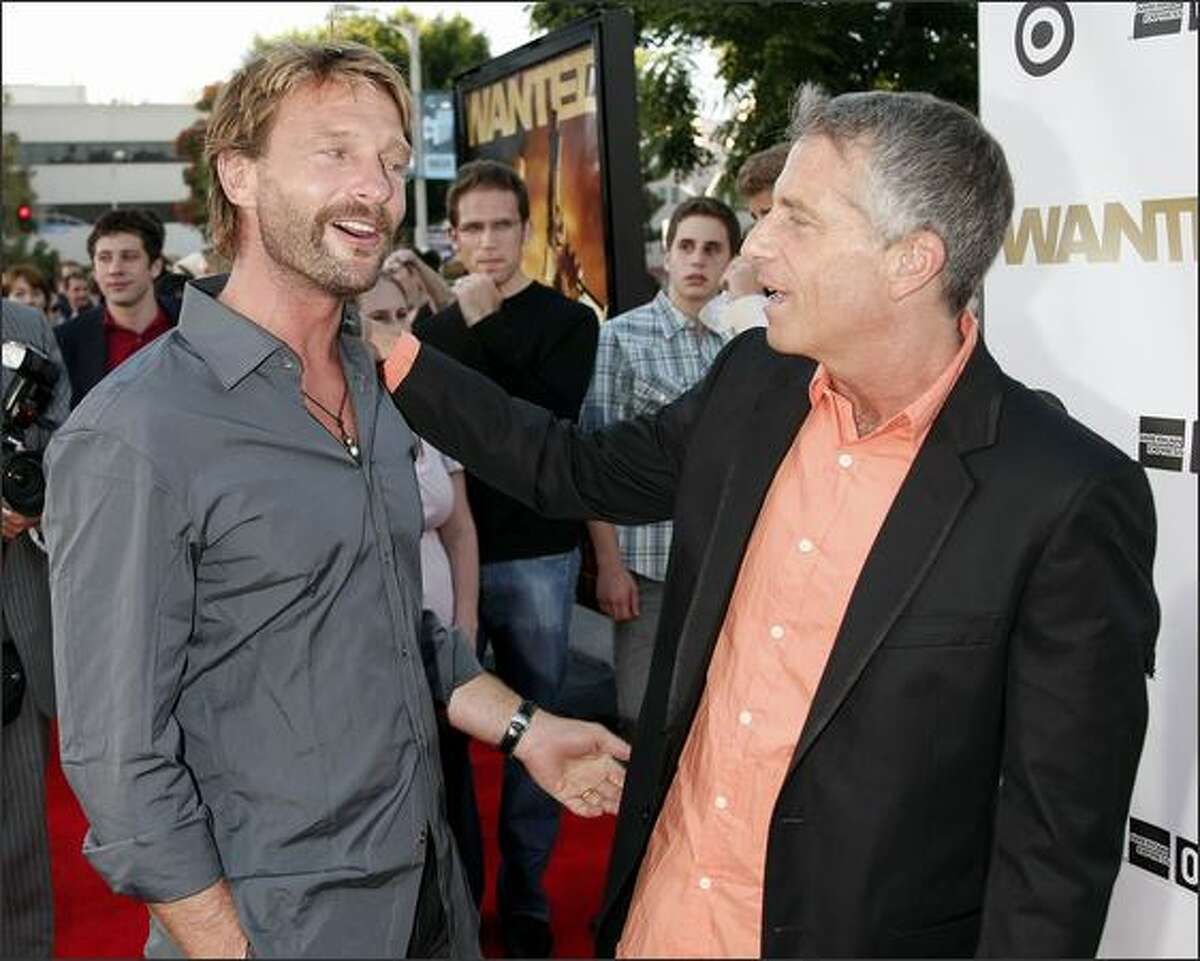 Actor Thomas Kretschmann (L) and producer Marc Platt arrive at the opening of the Los Angeles Film Festival with the premiere of Universal's "Wanted" at the Village Theater in Los Angeles, California.