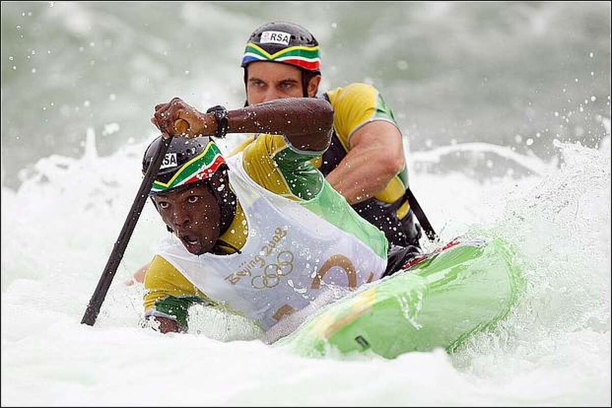Cameron McIntosh and Cyprian Ngidi of South Africa compete in the canoe/kayak slalom event at the Shunyi Olympic Rowing-Canoeing Park during Day 5 of the Beijing 2008 Olympic Games in Beijing, China. (Photo by Jed Jacobsohn/Getty Images)