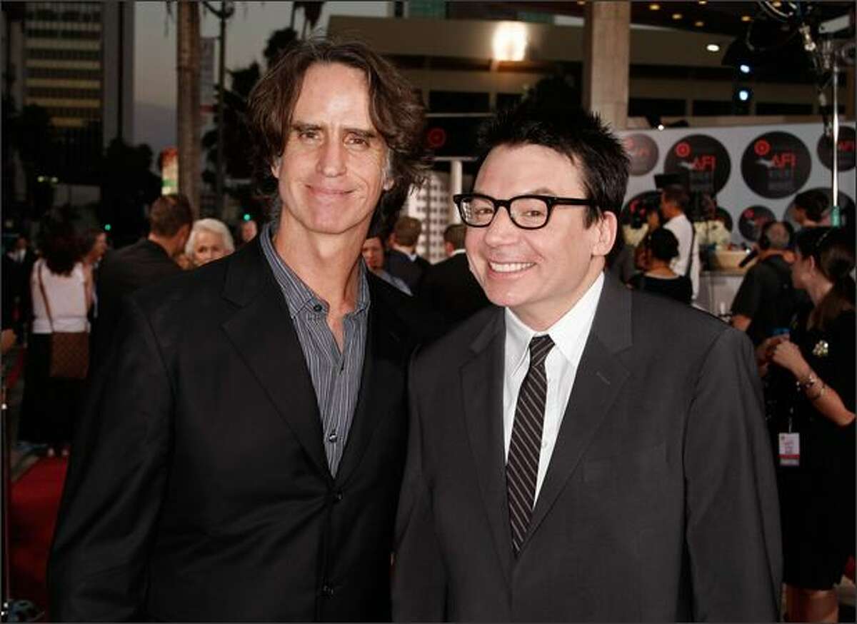 Director/producer Jay Roach (L) and actor Mike Myers arrive at AFI's Night At The Movies presented by Target held at ArcLight Cinemas on Wednesday in Hollywood, Calif.