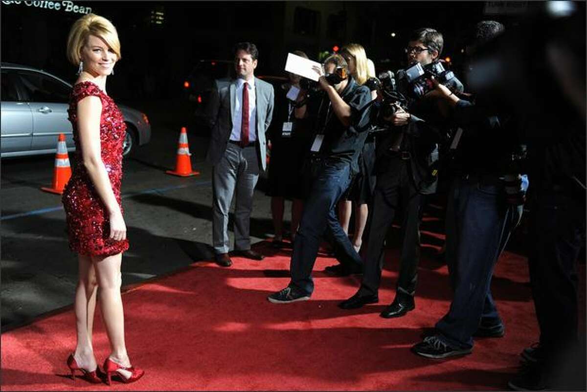 Cast member Elizabeth Banks, left, arrives for the premiere of "Zack and Miri Make a Porno" at Grauman's Chinese Theater on Monday in Los Angeles.