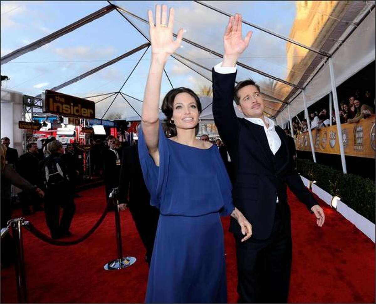 Actors Angelina Jolie and Brad Pitt arrive at the 15th Annual Screen Actors Guild Awards held at the Shrine Auditorium on Sunday in Los Angeles, California.