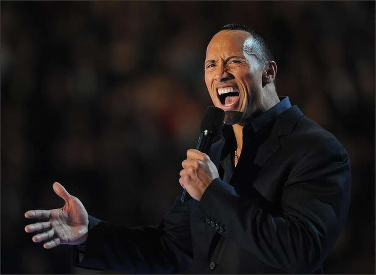 Actor and former wrestler Dwayne "The Rock" Johnson introduces Justin Timberlake.