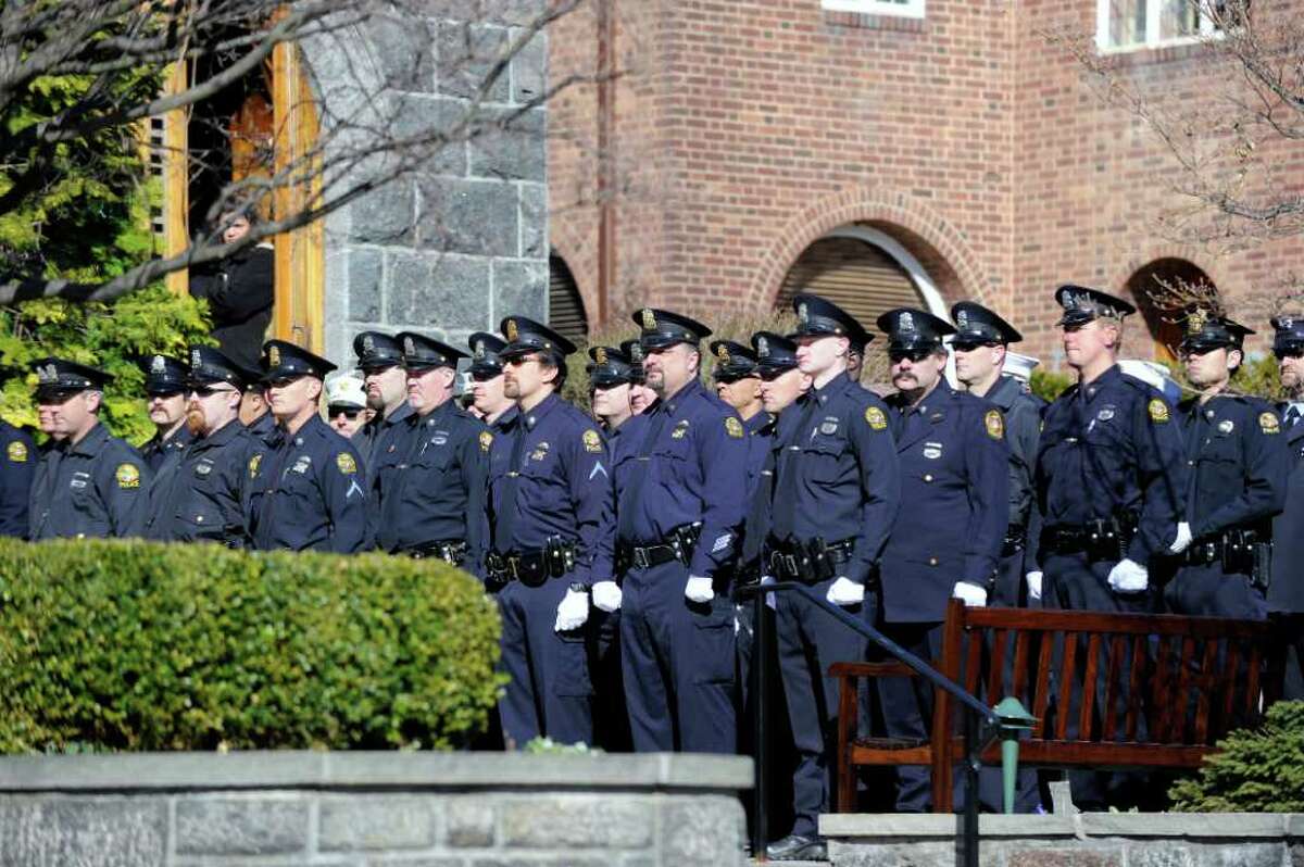 Greenwich police at the funeral service for fellow Greenwich Police Officer James Genovese at St. Mary Church, Greenwich, Saturday, March 26, 2011.