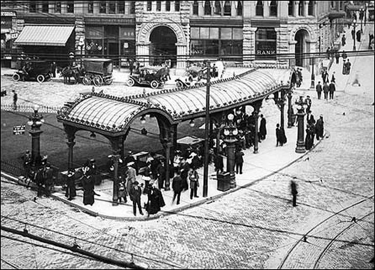 From the P-I archives: Pioneer Square's wrought iron pergola was constructed in 1909 at First Avenue and Yesler Street to shelter those waiting for streetcars. The beautiful example of Victorian craftsmanship is now a national historic landmark.