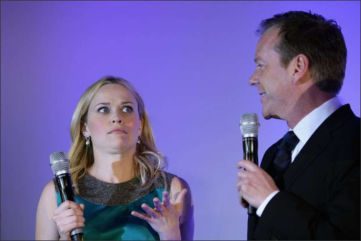 Actress Reese Witherspoon and actor Kiefer Sutherland attend the 'Monsters Vs. Aliens' German Premiere at the Colosseum in Berlin, Germany.