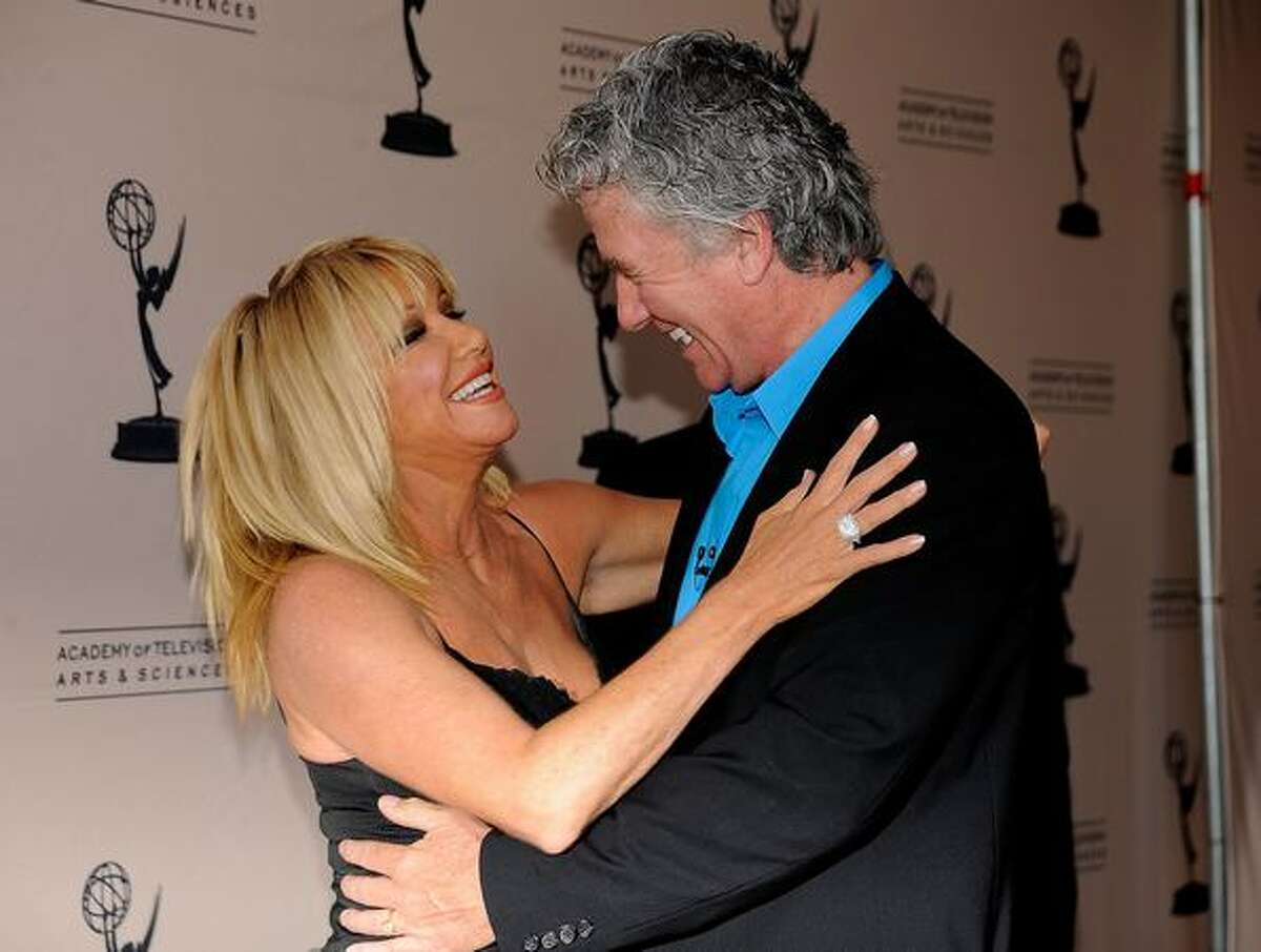 Former "Step by Step" co-stars Suzanne Somers and Patrick Duffy greet one another at the Academy of Television Arts & Sciences' "Father's Day Salute To TV Dads" in North Hollywood, Calif.