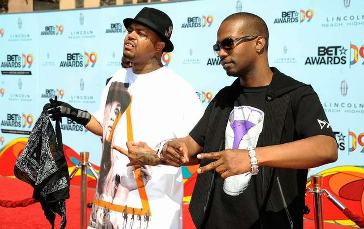 Rappers DJ Paul (L) and Juicy J of the group Three 6 Mafia arrive at the 2009 BET Awards held at the Shrine Auditorium on Sunday in Los Angeles, California.