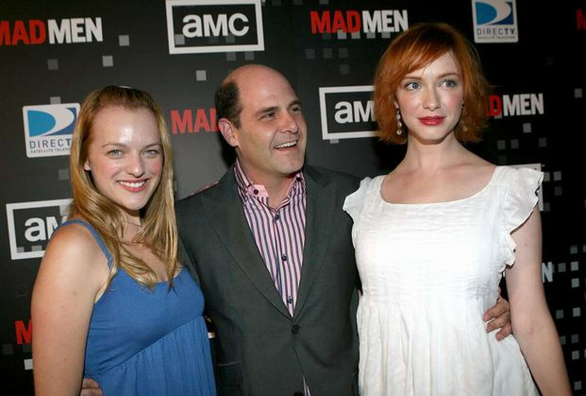 Actress Elisabeth Moss ("Peggy"), producer Matthew Weiner and Hendricks attend the wrap party for "Mad Men's" first season in Hollywood, Aug. 24, 2007.