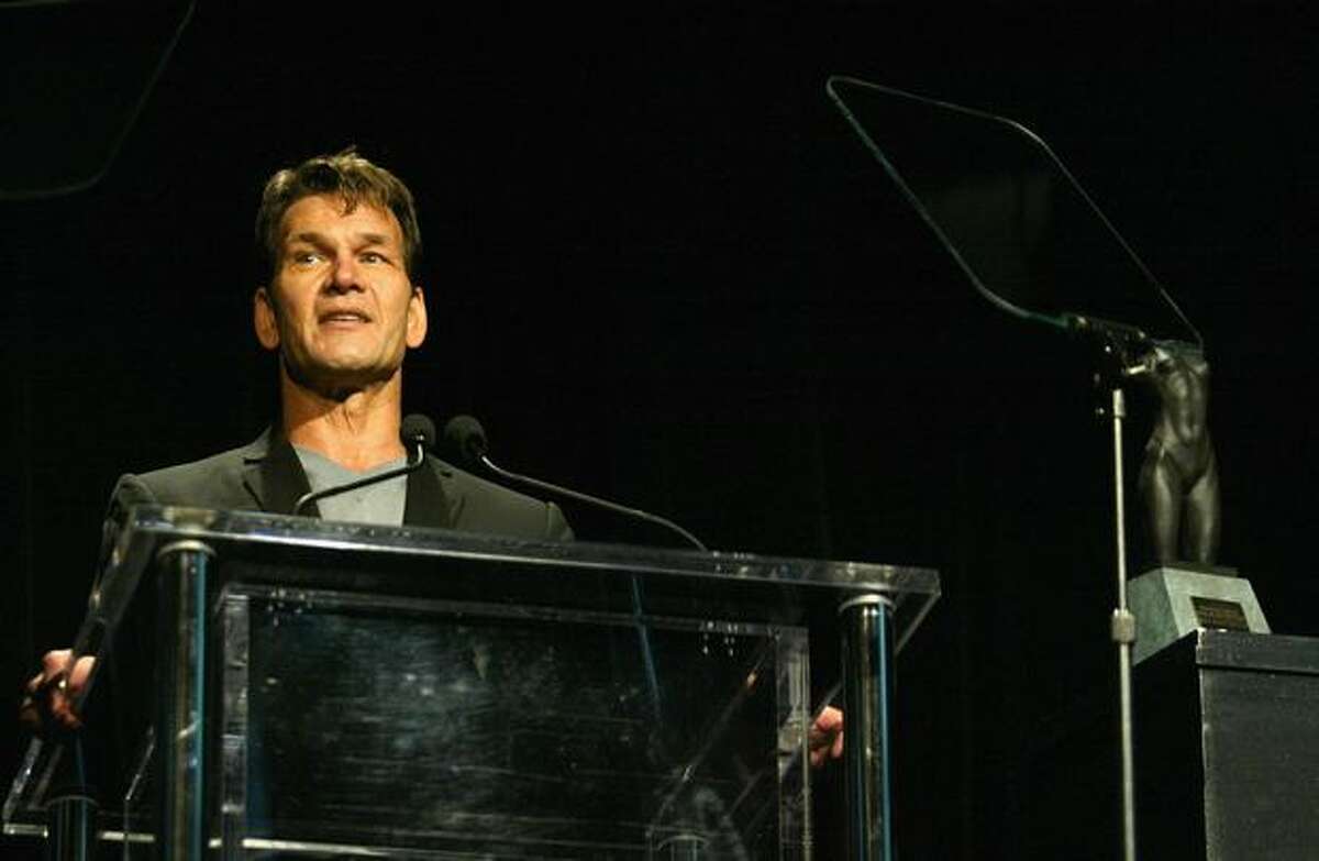Actor Patrick Swayze speaks on stage during the Rodeo Drive Walk Of Style Award Show on March 20, 2005 in Beverly Hills, Calif.