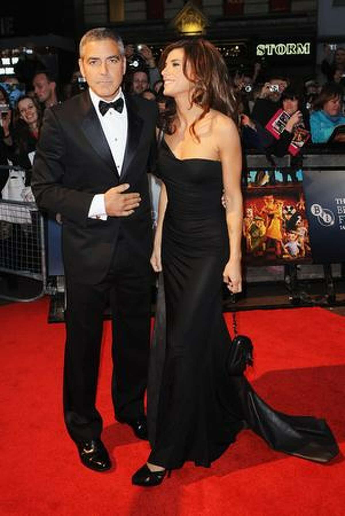 Actor George Clooney and girlfriend Elisabetta Canalis attend the world premiere of 'Fantastic Mr. Fox' and the opening gala of the Times BFI London Film Festival at the Odeon Leicester Square in London, England.