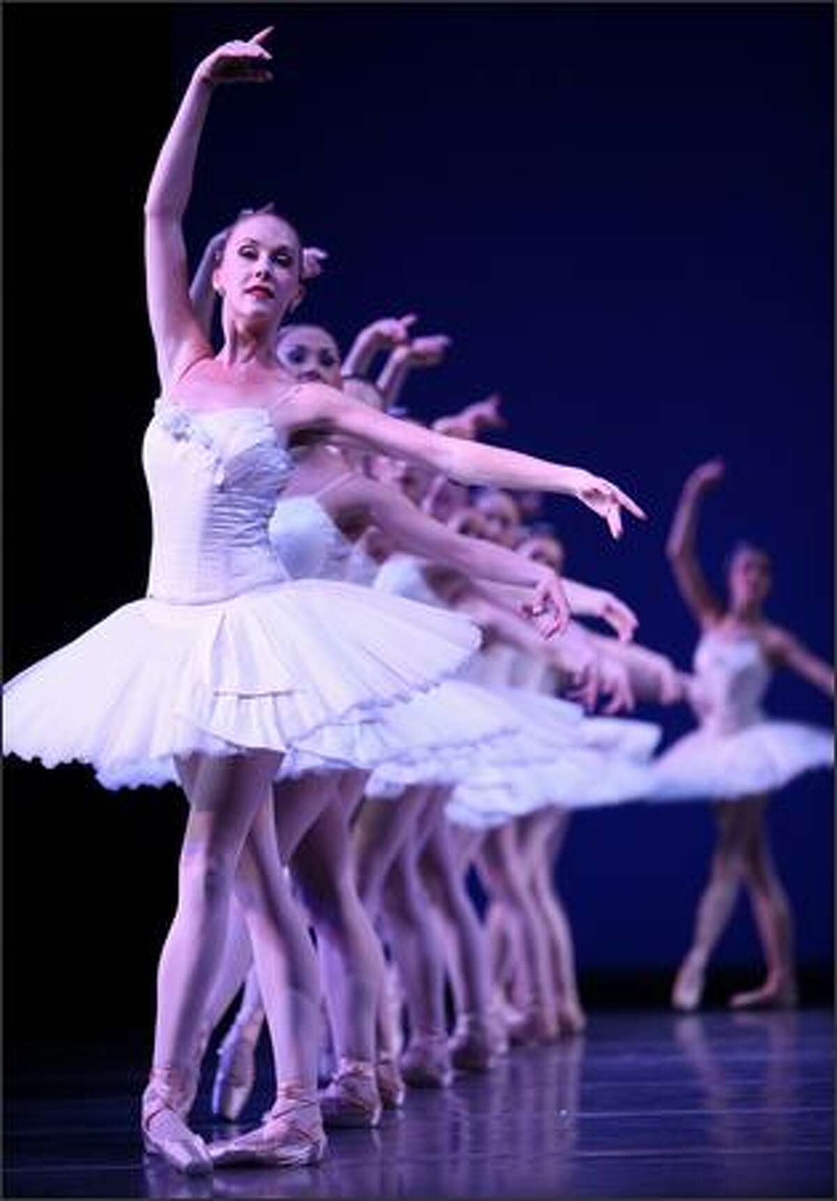 Corps de ballet dancer Kylee Kitchens and members of Pacific Northwest Ballet perform George Balanchine's "Symphony in C" during a dress rehearsal for the final program.