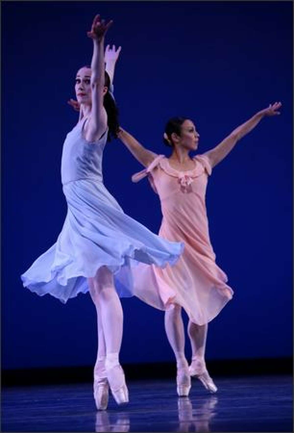 Corps de ballet dancer Sarah Ricard Orza, left, and principal dancer Kaori Nakamura of Pacific Northwest Ballet perform Jerome Robbins' "Dances at a Gathering" during a dress rehearsal for the final program.