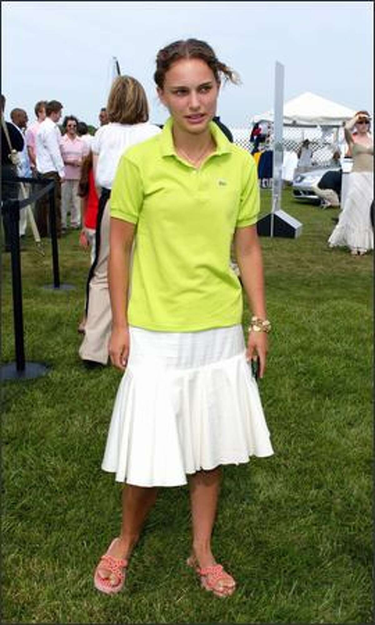 Natalie Portman attends the Mercedes-Benz Polo Challenge in Bridgehampton, N.Y., July 13, 2002.