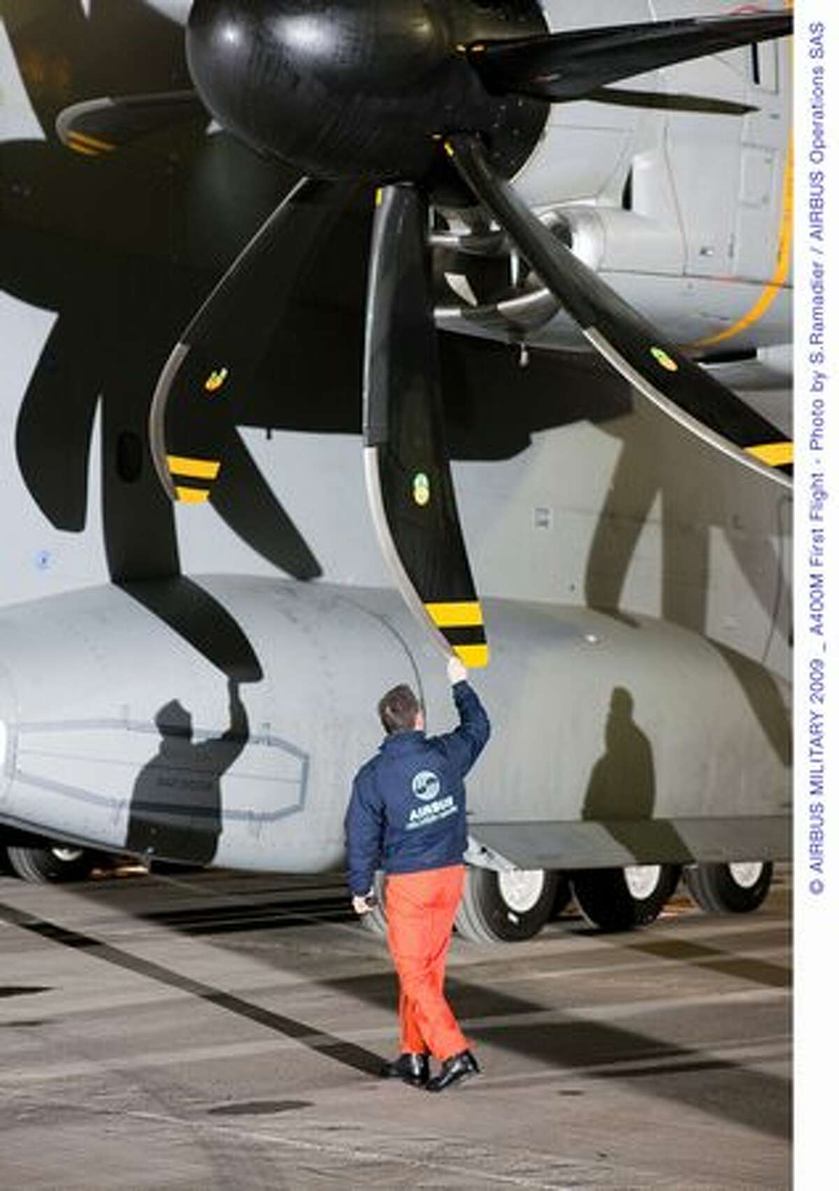 Flight crew inspects the Airbus A400M before takeoff on its first flight on Dec. 11, 2009 in Seville, Spain. (Airbus photo)