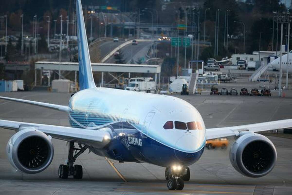 Boeing's 787 Dreamliner rolls down the taxiway during taxi tests on Saturday at Paine Field in Everett.