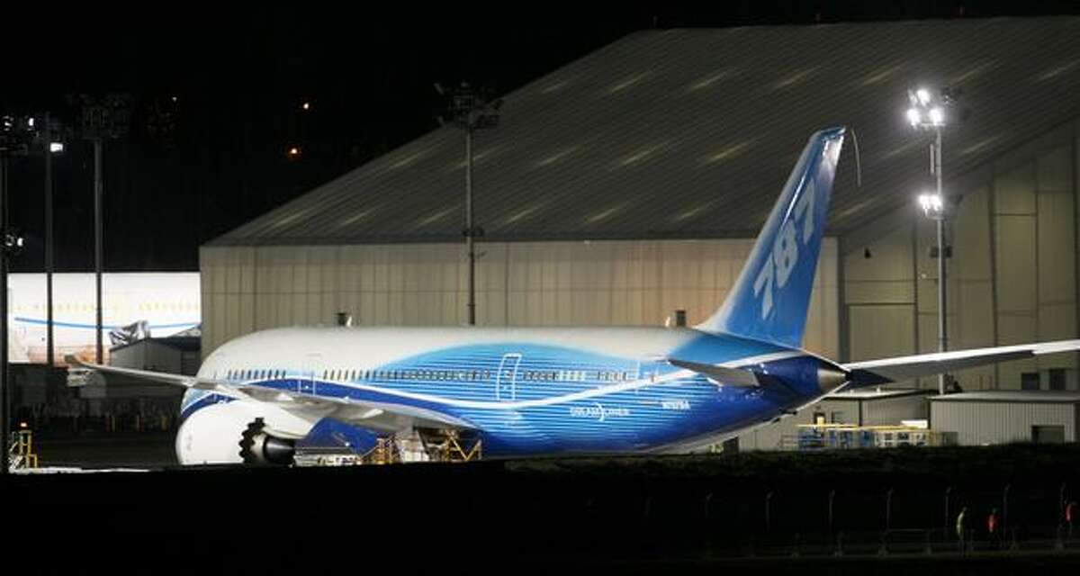 Boeing's 787 Dreamliner sits in a holding lot before making its first flight at Paine Field in Everett on Tuesday.